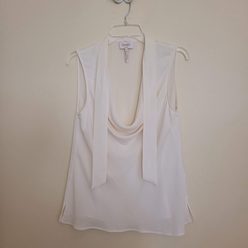 Sleeveless cream top size 6